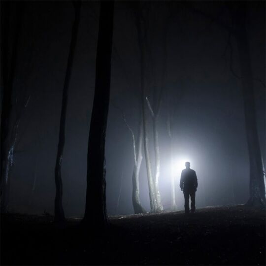 Image of man against moon background